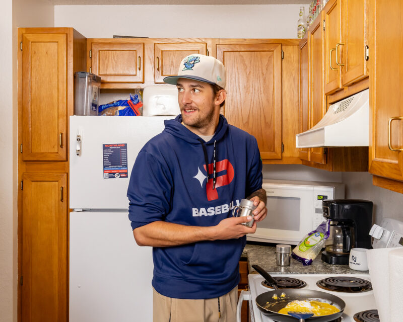 Student in Foundation Student Housing Apartments at Northland's Thief River Falls campus.