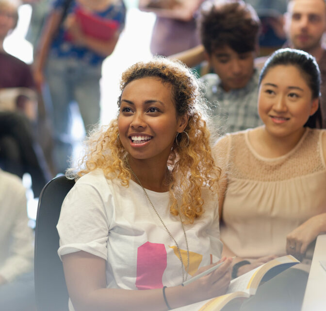 Woman in class with other students