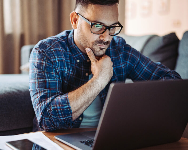 Student studying on a laptop