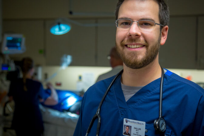 Respiratory Therapist student in hospital room