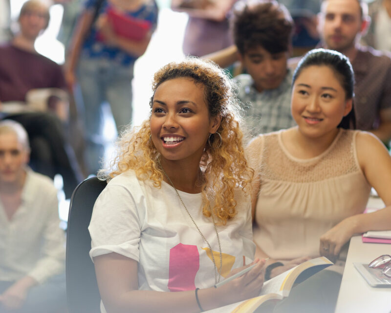 Woman in class with other students