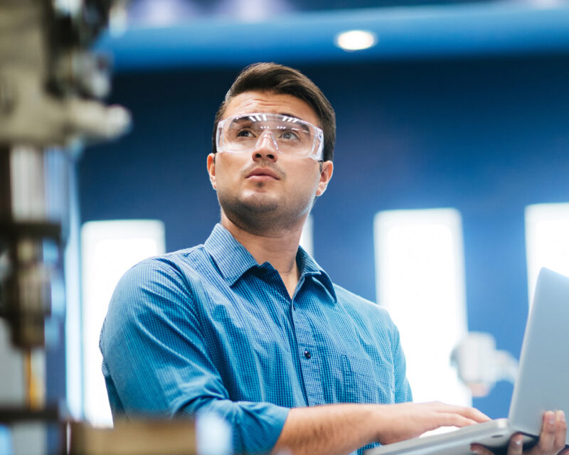 Student in Shop w/ triangles