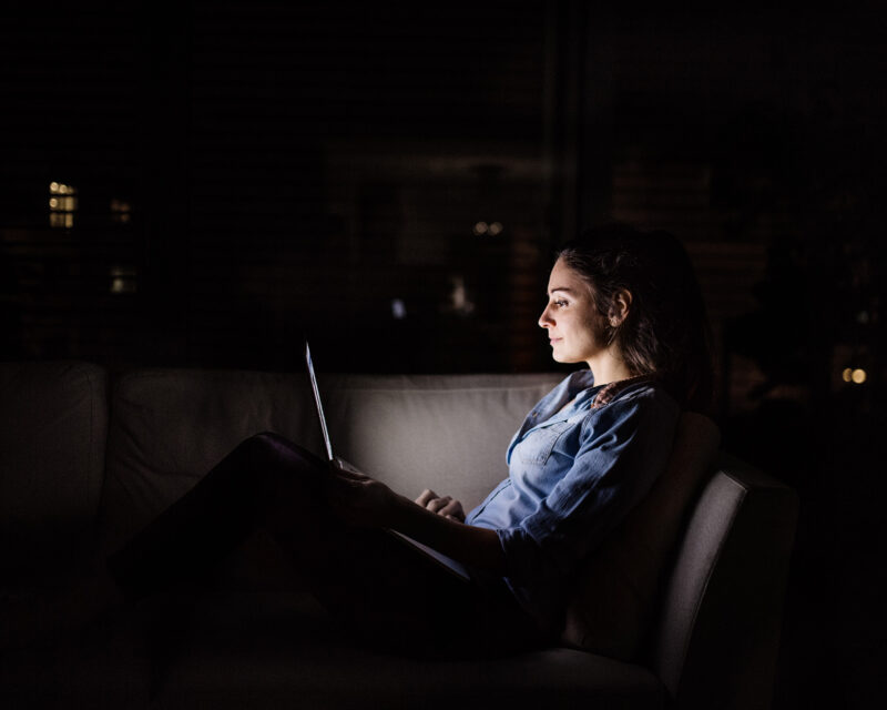 Student studying in the dark