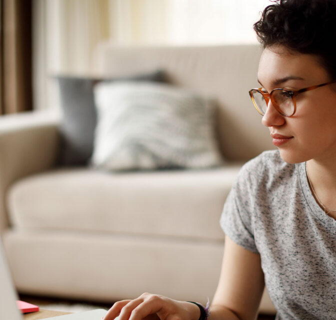 Student studying on a laptop