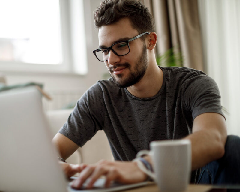 Student studying on a laptop