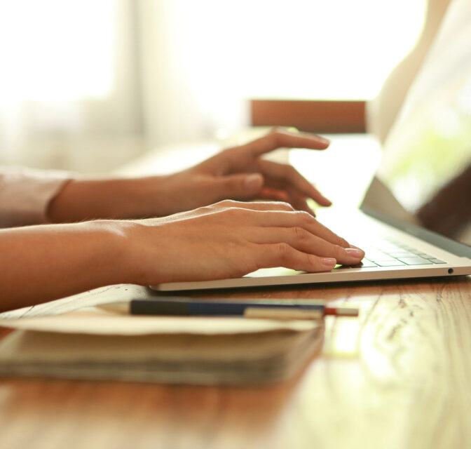 Student studying on a laptop