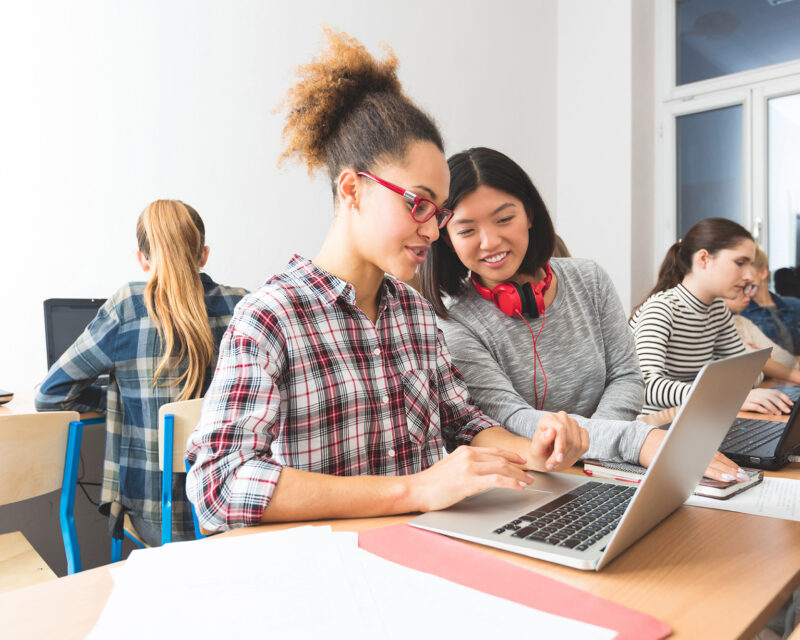 Students studying with laptop